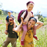 young girl on mothers shoulders
